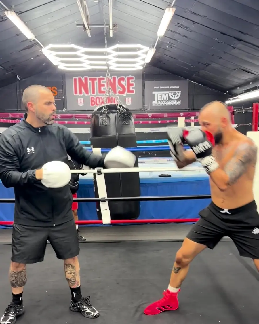 Inside the Intense Boxing gym: rings, heavy bags and the Intense Boxing sign
