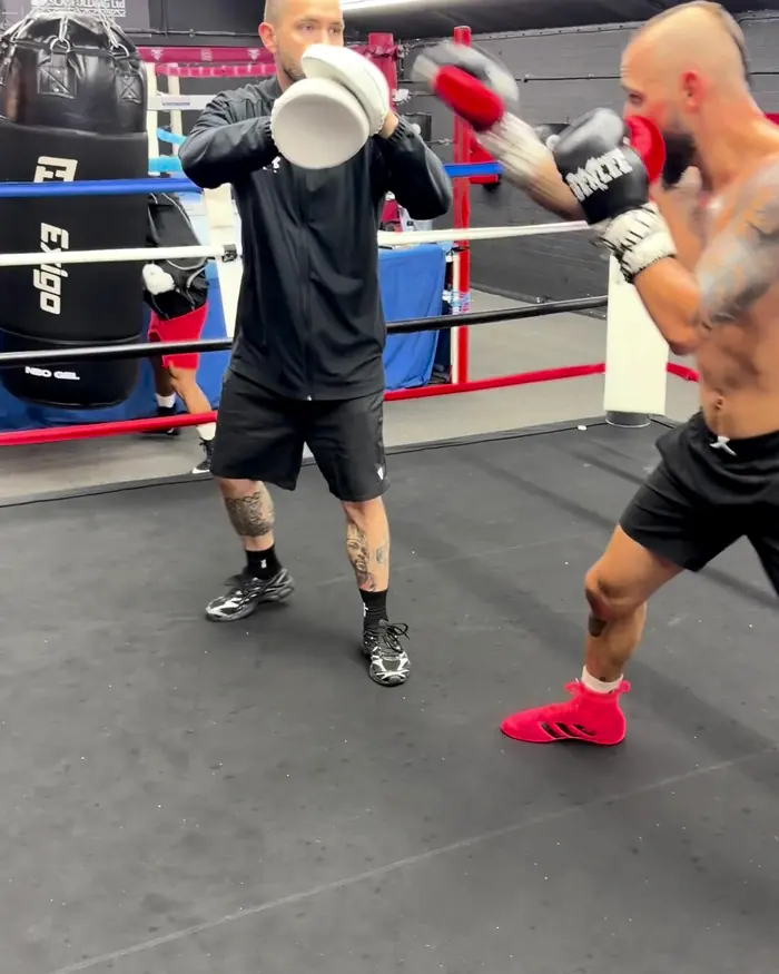 Coach and boxer drilling combinations on the pads